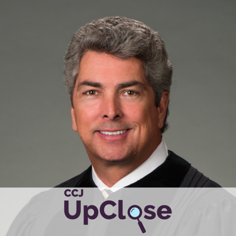 UpClose logo with headshot of Michael Boggs